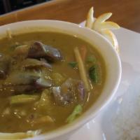 49. Green Curry · Coconut milk with green curry paste, bell pepper, eggplant, bamboo shoot and basil leaves.