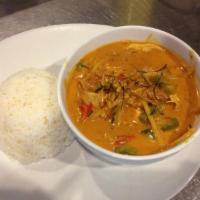 50. Panang Curry · Coconut milk with panang curry paste, bell pepper, bamboo shoot and lime leaves.