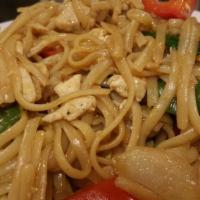 62. Siam Rice Noodles · Stir-fried egg noodles, egg, bell pepper, onion, scallion and curry powder with brown sauce.