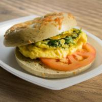 Spinach Scramble Bagel · 2 eggs, cheese, organic spinach and tomatoes on your choice of bagel.