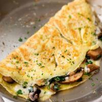 Taste Omelette served with potatoes and toast  · Mushrooms, onions, green and red peppers, bacon and cheddar cheese.