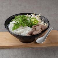 Pho · Traditional beef soup base with sliced filet Mignon, rice noodles and aromatic herbs.