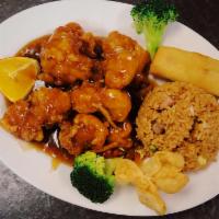 Orange Chicken Combination Dinner · Served with choice of egg flower soup or hot and sour soup, egg roll, crab Rangoon and BBQ p...