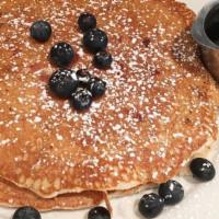 Blueberry Pancakes · Buttermilk pancakes with blueberries and inside and out.