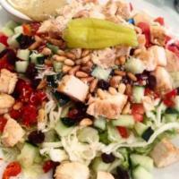 Special Chopped Salad with Chicken · Grilled chicken, sun-dried tomatoes, toasted almonds, raisins, Roma tomatoes, cucumbers. Moz...