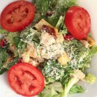 Grilled Chicken Caesar Salad · Grilled chicken, romaine lettuce, Parmesan cheese, Roma tomatoes, sun-dried tomatoes, crouto...