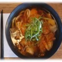 Kimchi Udon · Traditional udon broth with fresh kimchi, chopped chicken, onion, scallion, mushroom and egg.