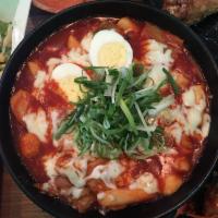 C&N Cheese Tteok Bokki · Served with light fried chewy rice cake and assorted fish cake with a boiled egg, cabbage, s...