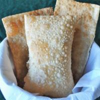 Pastel Queijo · Brazilian style empanada made with thin fried dough stuffed with cheese.