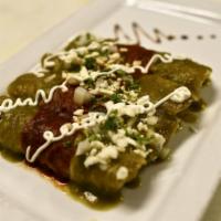 Enchiladas Indigenas · Four rolled corn tortillas stuffed with mashed potatoes and vegetables, topped with salsa Za...