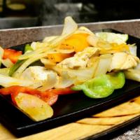 New Rebozo Chicken Fajitas · Sautéed chicken served with sizzling bell peppers and onions. With side of sour cream, guaca...