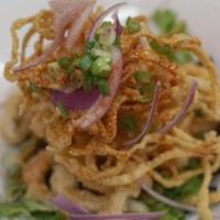 Crispy Calamari Salad · Crispy calamari, onions and cilantro tossed with house sesame dressing on mixed green salad ...