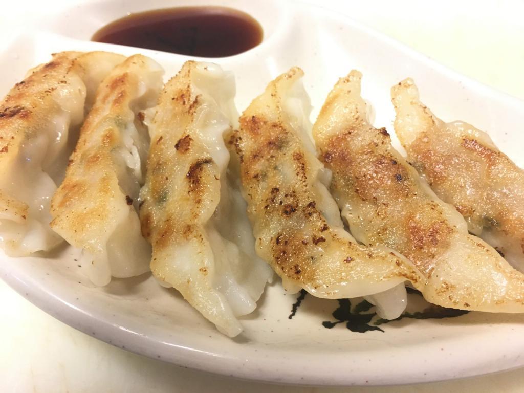 6 Pieces Gyoza · Pan fried chicken dumplings.