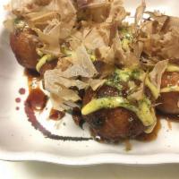 6 Pieces Takoyaki · Wheat flour batter, with octopus inside, drizzle with mayo and eel sauce, top with bonito fl...