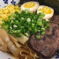 2. Shoyu Ramen · Soy sauce soup base serve with tender beef shank. Come with noodle, corn, egg, scallion, bam...