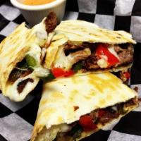 Fajita Quesadilla · With grilled bell peppers and onions.