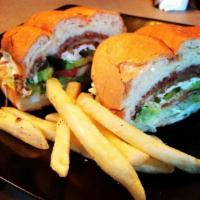 Milanesa De Res Torta · Breaded steak. Mexican sandwich served with lettuce, tomatoes, cheese, onions, refried beans...