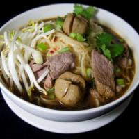 66. Noodle Soup w/ Meatballs - Thai Boat · Choice of fat or small noodles with beef, meatballs, bean sprouts, onions and cilantro. Spicy.