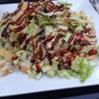 1. BBQ Chicken Salad · Chopped iceberg lettuce, Persian cucumbers, grape tomatoes, sliced ripe olives, scallions, f...