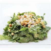 2. Caesar Salad · Crisp romaine lettuce hearts, baked seasoned croutons and shaved
Parmesan cheese served wit...