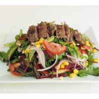 13. Steak Salad · Organic baby field greens, Persian cucumbers, grape tomatoes, fire roasted corn, baked beets...