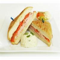 18. Ham and Cheese Panini · Black forest ham, Swiss cheese, tomatoes and crispy pickles with
Dijon mustard. 