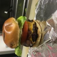 Meat-a-tarian Burger · 1/2 lb Patty, Grilled, with melted Cheddar and Beacon, Sautee Onions, and BBQ Sauce, and ser...