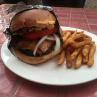 Burger · 1/2 lb of Ground Angus Chuck, Flame Grilled, topped with toppings of your choice, served on ...