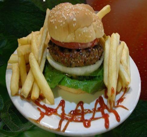 Sultan's Burger · Fresh marinated ground beef patty, tomatoes, onion, and lettuce.