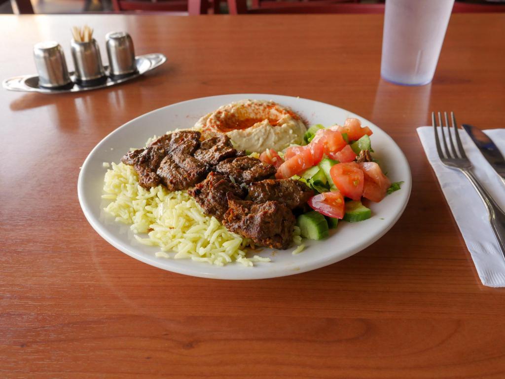 Beef Shish Kebab · Tender lamb chunks marinated and grilled with jalapeño and tomato.
