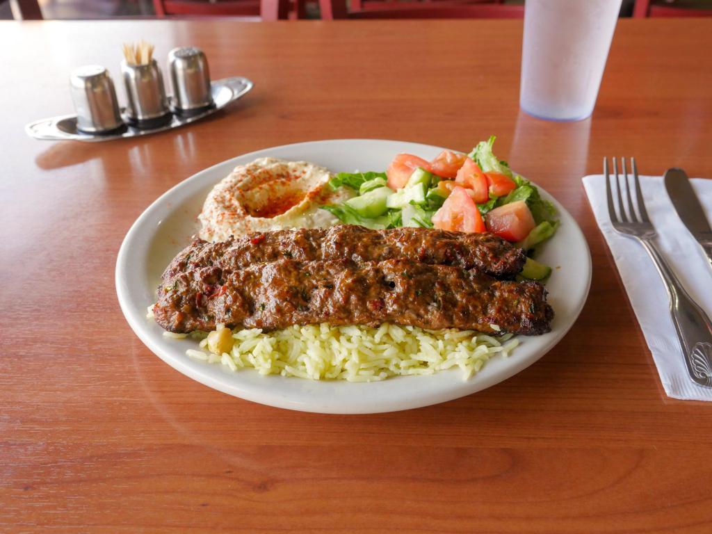 Chicken Luleh Kebab · A mix of chicken, ground beef, parsley, garlic, and black pepper grilled to perfection.