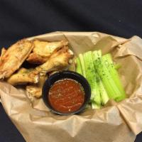 Wings · served with celery sticks, choice of 1 dipping sauce and 1 tossing sauce per every 6 wings