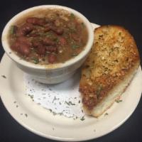 Red Beans and Rice · House-made with smoked pork sausage and ham.  Served with garlic toast.