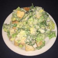 Caesar Salad · Romaine, grated Italian cheese, croutons and Caesar dressing.