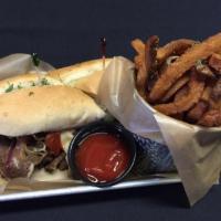 Cheesesteak Hoagie · Topped with melted provolone cheese, caramelized red onions and red & green bell peppers. Se...