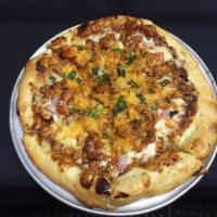 BBQ Chicken Pizza · Grilled chicken with tomatoes, red and green onions, cheddar and mozzarella cheese.