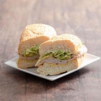 Smoked Turkey Sandwich · Turkey breast (smoked), lettuce, mild peppers, with mustard and mayonnaise.