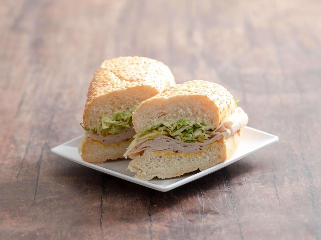 Smoked Turkey Sandwich · Turkey breast (smoked), lettuce, mild peppers, with mustard and mayonnaise.