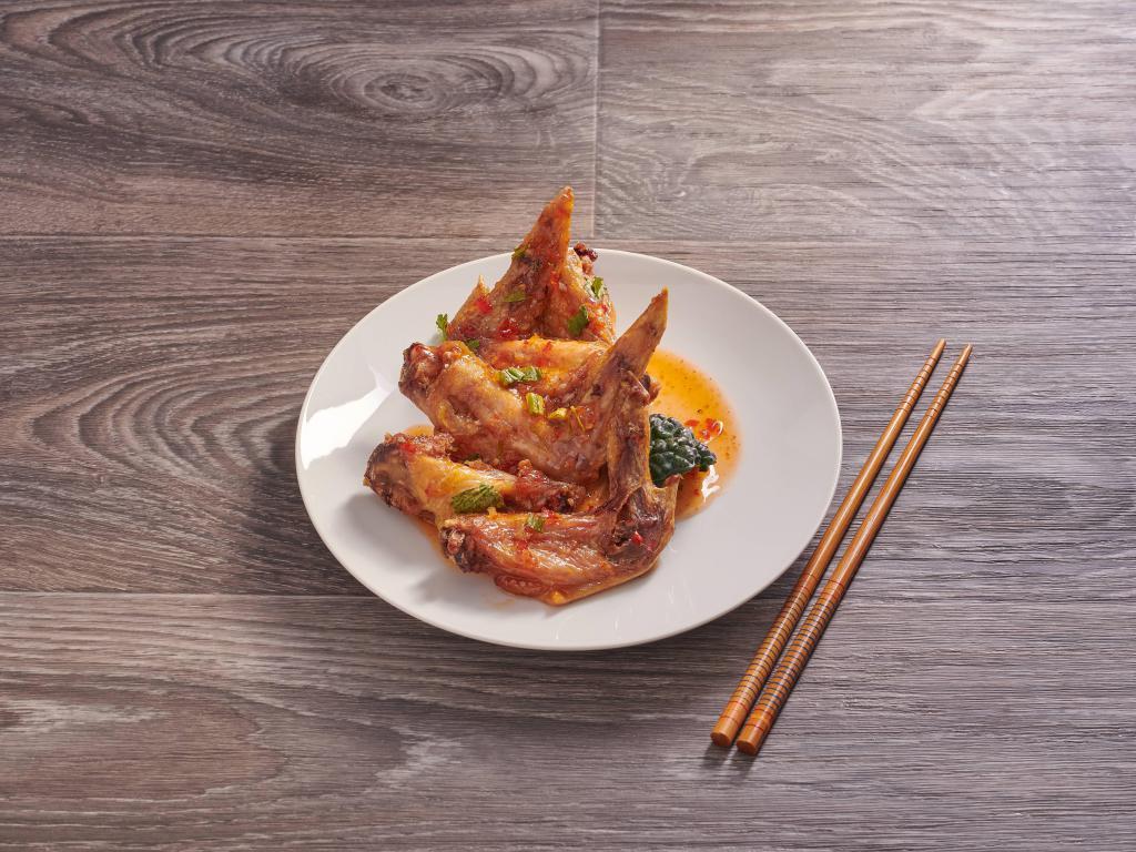 Angel Wings · Served with Siamese spiced crispy style chicken wings.