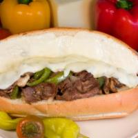 N.Y. Steak Submarine · Thinly sliced steak, green peppers, and onions.