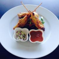 4. Chicken Satay · Grilled chicken breast marinated with yellow curry powder and coconut milk on skewers. Serve...