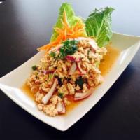 9. Larb Chicken Salad · Ground chicken, red onion, green onion, mint and cilantro mixed with ground roasted rice in ...