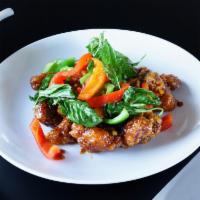 S6. Crispy Garlic Chicken · Stir fried crispy chicken with garlic in sweet chili paste topped with bell pepper and crisp...