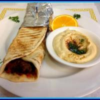 Athenian Kefta Panini Style in Large Pocket Pita Sandwich · Seasoned ground beef grilled to perfection wrapped in large pita with grilled onions, house ...