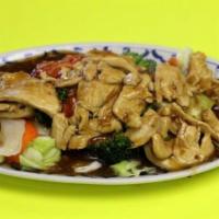 31. Garlic Chicken · Sauteed chicken with lots of garlic sauce served on top of steamed vegetables.