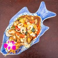 43. Seafood Combination · Combination seafood sauteed in white wine sauce, chili sauce, oyster sauce, mushroom, baby c...