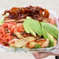 Grilled Chicken Avocado and Bacon Salad · Mixed greens, grilled chicken, avocado, bacon, cucumber and Roma tomatoes.