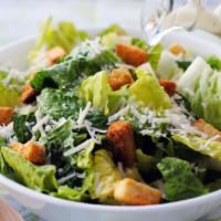 Caesar Salad · Romaine lettuce, Caesar dressing, croutons and Parmesan cheese.