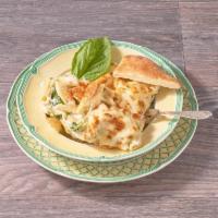 Alfredo Pasta · Penne pasta with spinach in creamy Alfredo sauce, Parmesan and mozzarella cheese.