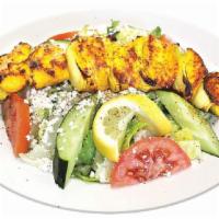 20. Chicken Kebab Salad · Chicken kabob on house salad. served with pita bread. Halal.